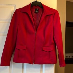 Beautiful deep red dress jacket. Heavy quilt like fabric. Zipper sleeves